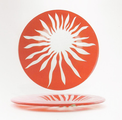 Turgla's off-centered glass plate with sun design comes in red and turquise and is exactly the kind of creative, yet practical product that www.tabletopjournal.com likes to showcase.
